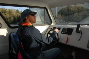 Bryan Phillips driving an Explorer 24 from the helm