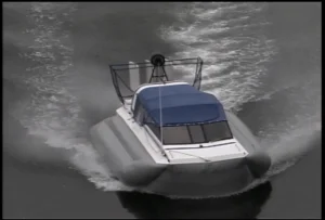 The Explorer 20 hovercraft running under the Juneau Douglas bridge, 1998