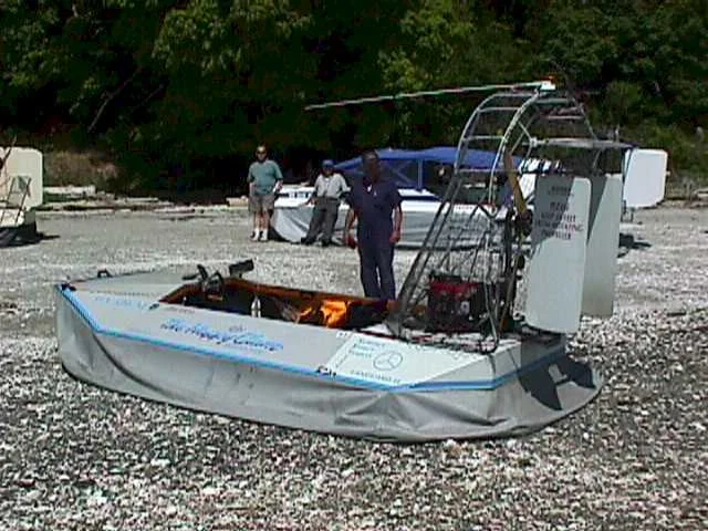 Dave Crawford with his Vanguard hovercraft and the Explorer 20 at Sandy Island, 1998