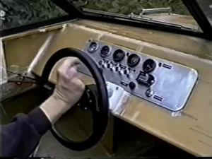 The helm of the Explorer 20 prototype with steering wheel and aluminum gauge panel