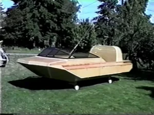 The Explorer 20 prototype hull on the lawn with its windshield frame fitted, July 1995