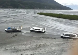 An Explorer 22 and Explorer 24s parked on the Taku Glacier flats