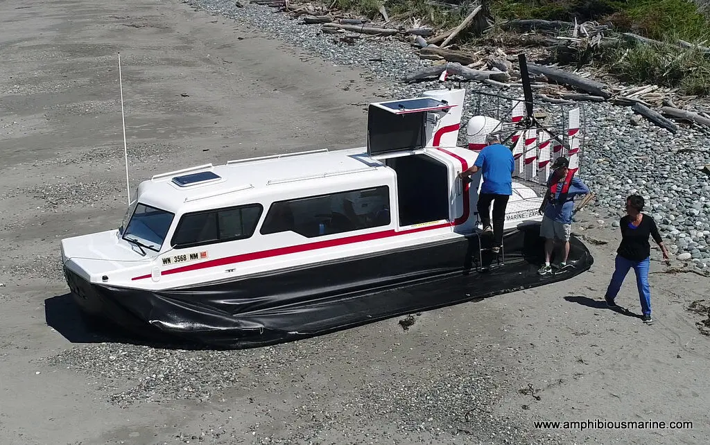 Passengers boarding an Explorer 24 hovercraft in northern Canada