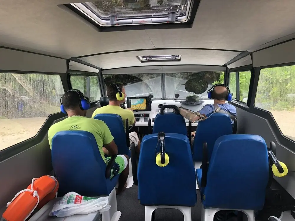 Interior of an Explorer 24 cabin with seating for twelve passengers