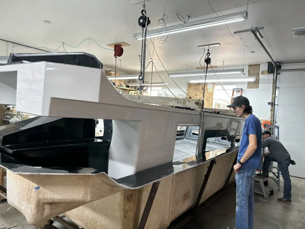Explorer 24 cabin top part being fitted in the shop