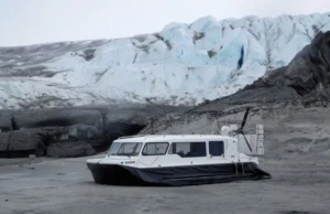 Explorer 24 below the ice face of Taku Glacier
