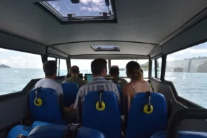 The Seychelles crew in the Explorer 24 cabin looking out the windows