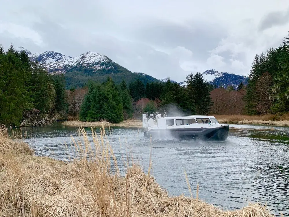 Explorer 24 hovercraft running a shallow river in southeast Alaska