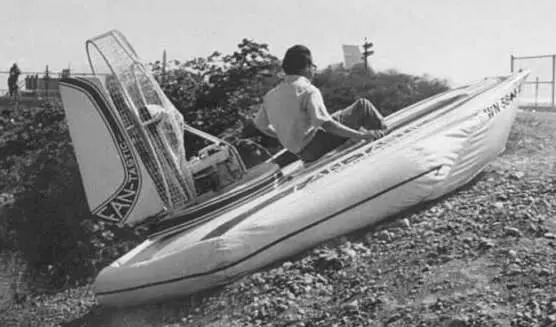 Black and white photo of a Fantastic 1 hovercraft climbing a steep gravel bank in Renton, Washington
