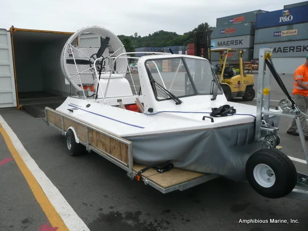 Hovercraft on its fly on/off trailer, sized to fit a shipping container