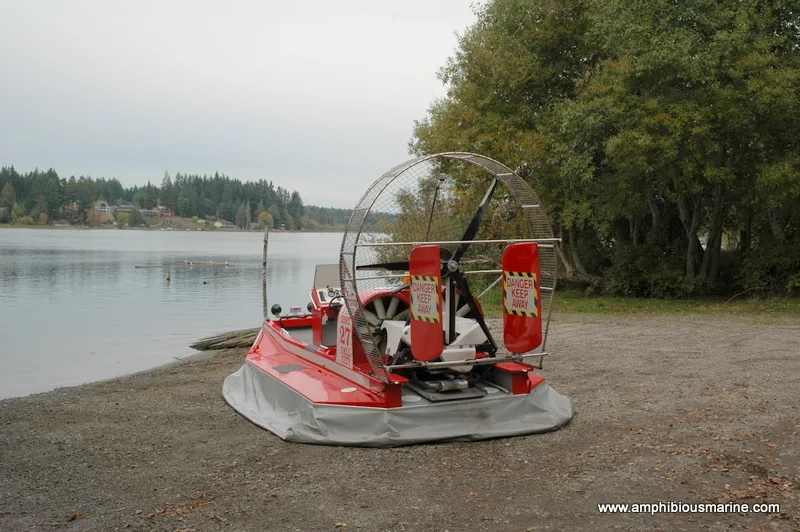 Prospector rescue hovercraft parked on a lake shore