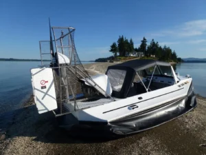 Surveyor 16 with full enclosure on a beach
