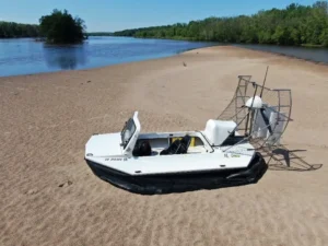 Surveyor 16 on an open sand beach