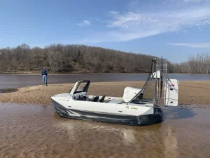 Surveyor 16 on a sandy river bank