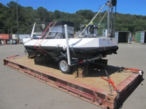 A Vanguard 14-28 kit hovercraft strapped to a flat rack for shipping