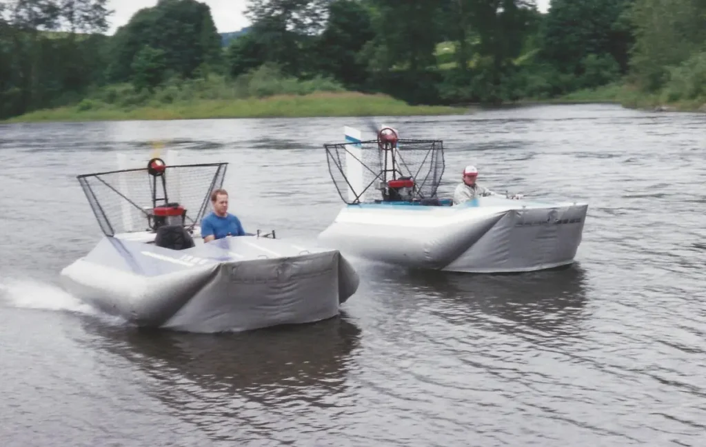 Two Vanguard 14 hovercraft side by side on the Skykomish River near Monroe, Washington